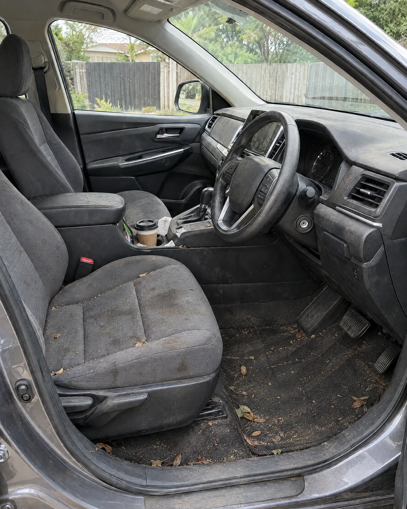Before: dirty SUV carpets and seats